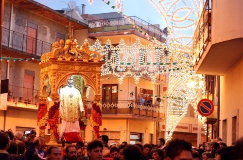 Saint Philip of Agira with the Gospel in his left hand, the symbol of the exorcists, in the May celebrations in his honor at Limina, Sicily