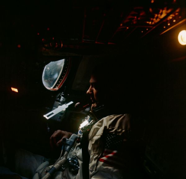 Buzz Aldrin with slide rule during Gemini 12 mission