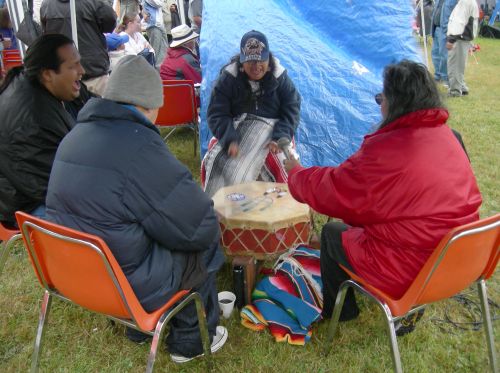 United Indians of All Tribes Foundation drummers at the Seafair Indian Days Pow Wow, Daybreak Star Cultural Center, Seattle, Washington