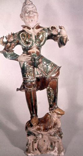 Xunzang: The Dark History of Chinese Sacrificial Burial 8 Figure of a 'lokapala' (Buddhist guardian), standing on a bull