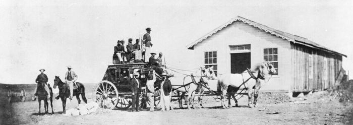 Buffalo soldiers guard a Concord stagecoach, 1869