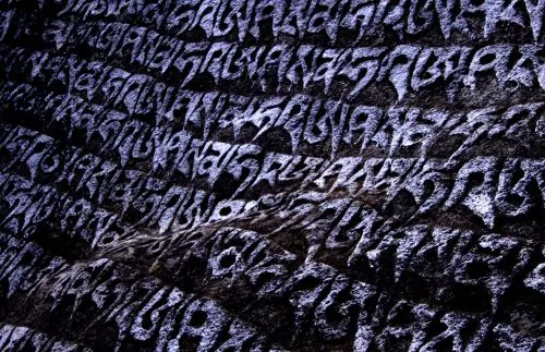 Mantras written on a rock near Namche Bazaar Nepal
