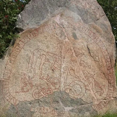 Böksta Runestone (U 855) which possibly depicts Odin with Gungner and his wolves Geri and Freki hunting a forrest bride