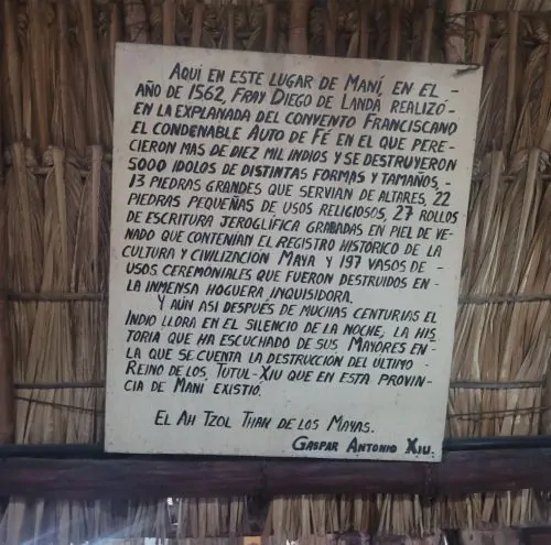 Sign about the burning of Mayan codices in Maní