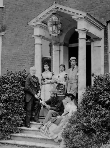 Group portrait in the porch at Gads Hill Place in 1862