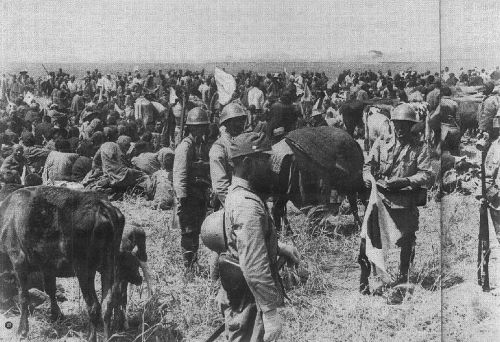 Japanese troops guarding Chinese refugees displaced by war and the Yellow River Flood, China Jun-Jul 1938