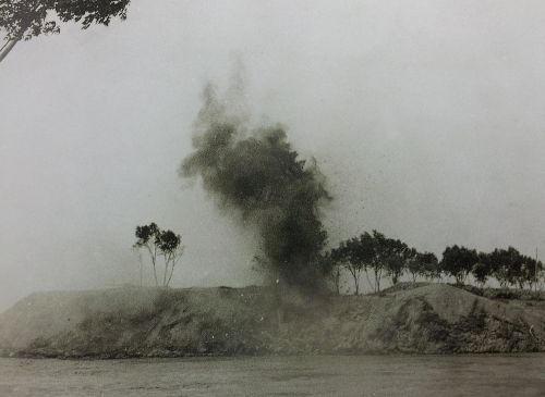 Japanese artillery bombarding banks of Yellow River